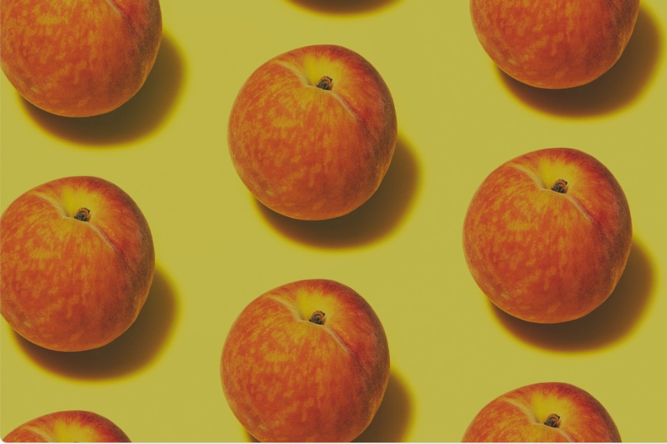 un pattern de pomme disposé symetriquement sur un fonds jaune